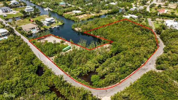 PRIME 11.4-ACRE DEVELOPMENT OPPORTUNITY WITH BOAT HOUSE POTENTIAL IN DESIRABLE RED BAY, HERON BAY