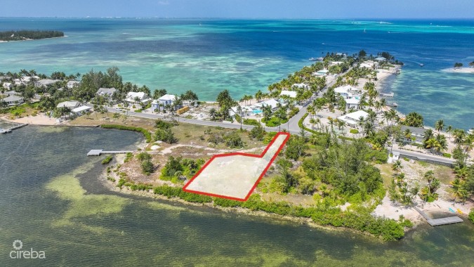 BEACHFRONT LOT IN CAYMAN KAI/RUM POINT WITH PRIVATE ROAD ACCESS