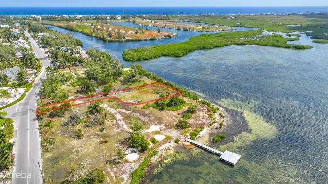 BEACHFRONT LOT IN CAYMAN KAI/RUM POINT WITH PRIVATE ROAD ACCESS