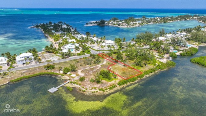 BEACHFRONT LOT IN CAYMAN KAI/RUM POINT WITH PRIVATE ROAD ACCESS