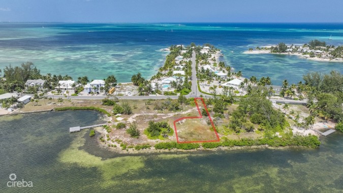 BEACHFRONT LOT IN CAYMAN KAI/RUM POINT WITH PRIVATE ROAD ACCESS