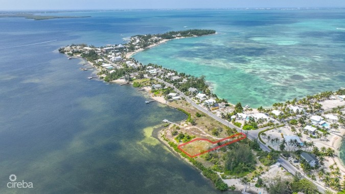 BEACHFRONT LOT IN CAYMAN KAI/RUM POINT WITH PRIVATE ROAD ACCESS