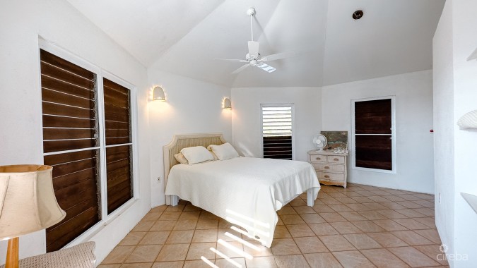 LITTLE CAYMAN LAND WITH BEACHFRONT COTTAGE